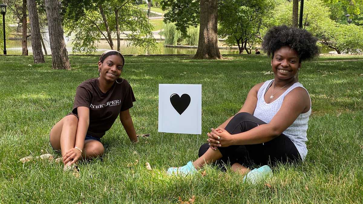 Sisters create yard signs to show support for Black lives