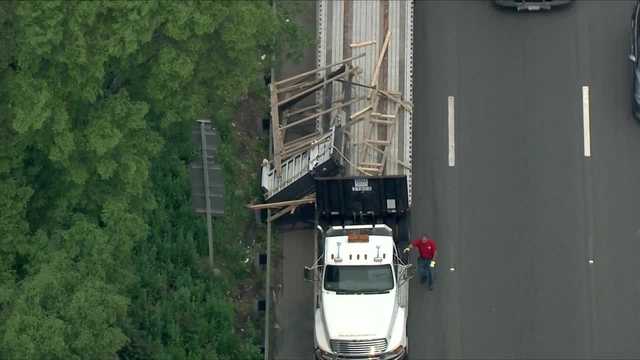 Tractor-trailer carrying window panels hits Boston bridge - Vimarsana News