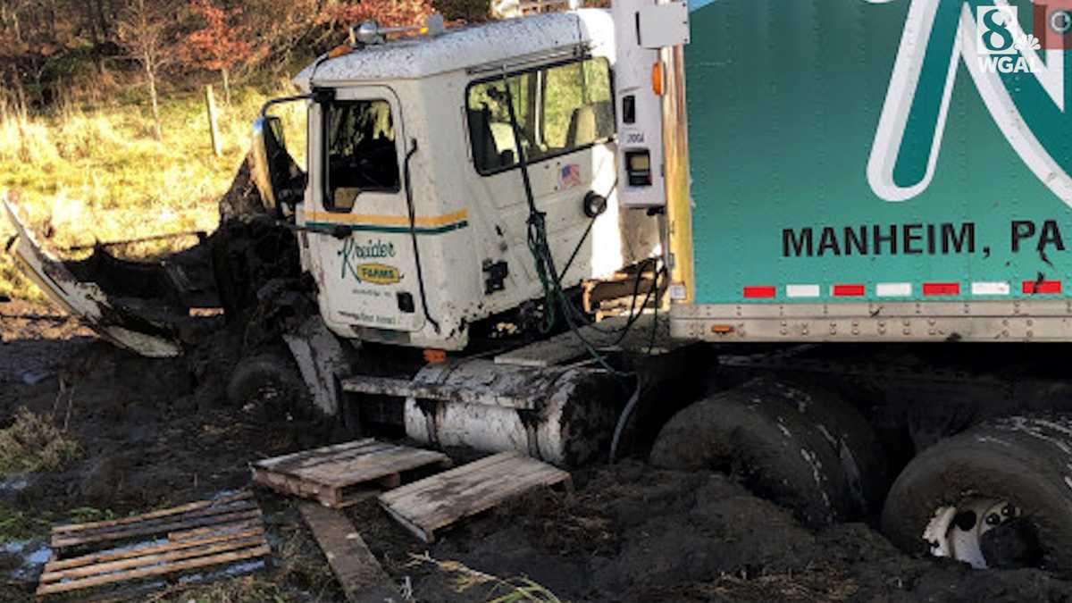 Kreider's Farms tractortrailer crashes, gets stuck in mud