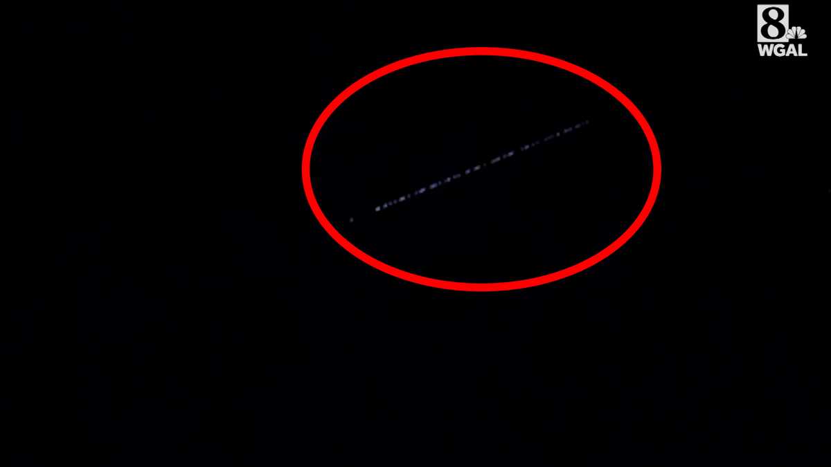 People report line of lights in the night sky