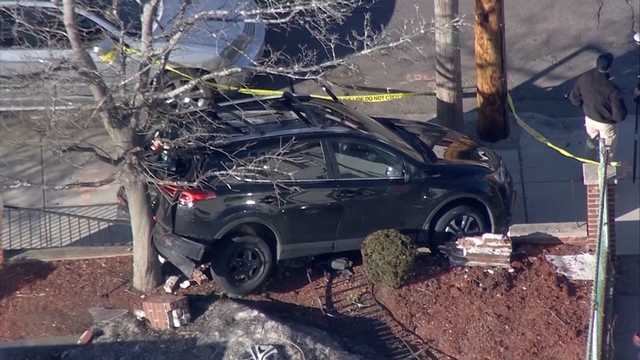 Woman struck, killed by vehicle that crashed through repair shop garage - Vimarsana News
