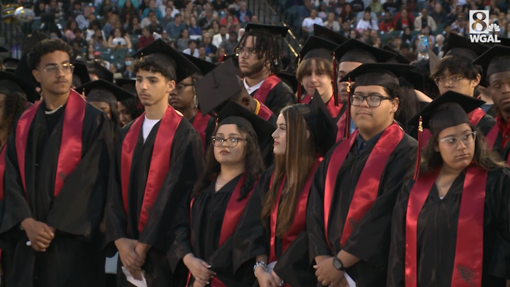 Rain delay fails to dampen celebration at McCaskey High School graduation