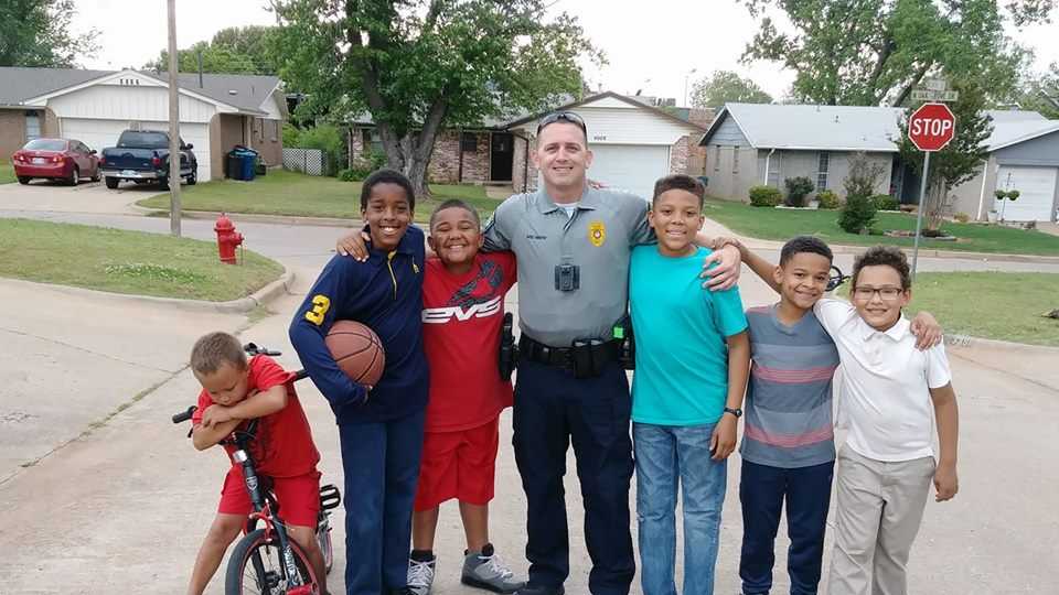 Watch: Police officer plays basketball with children in Midwest City ...