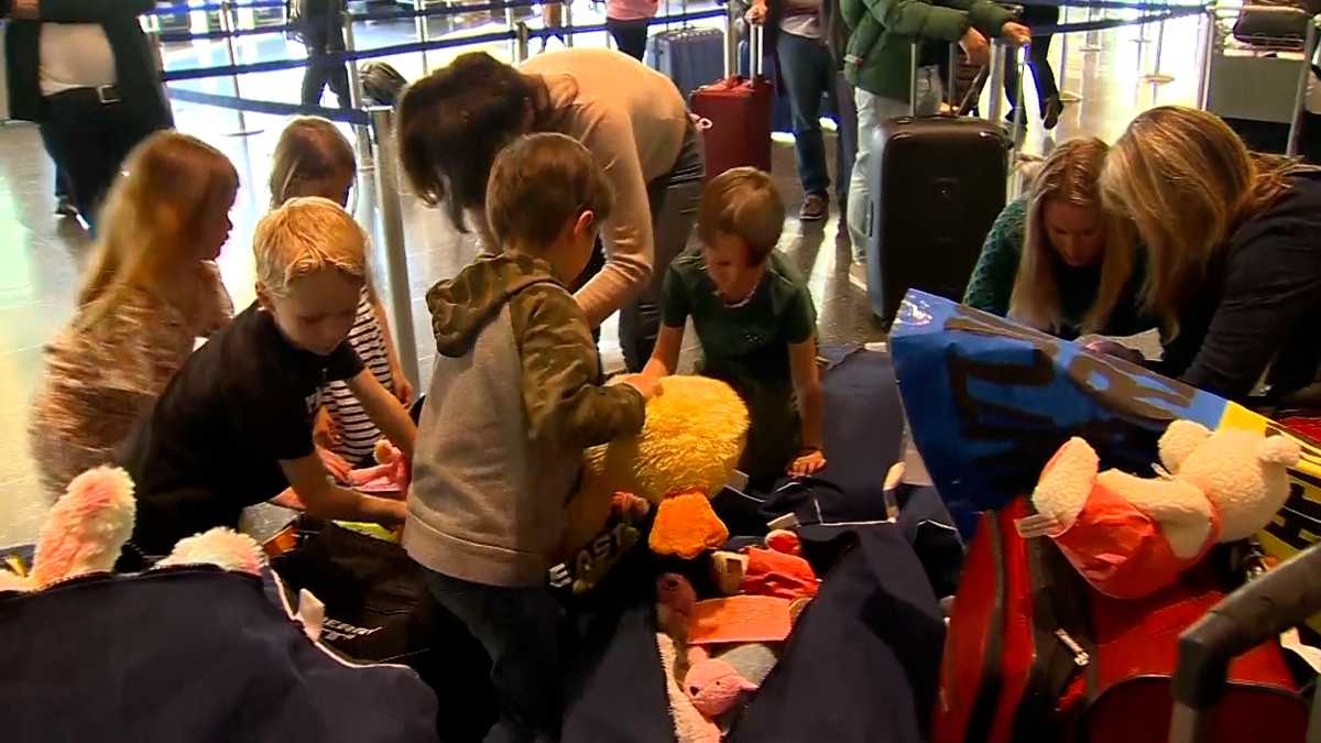 Kids from Nantucket pack stuffed animals for Ukrainian families