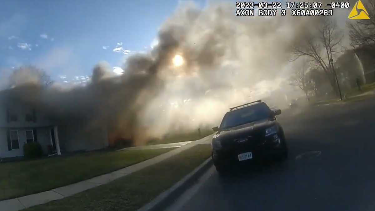 Video shows officer saving residents from house fire