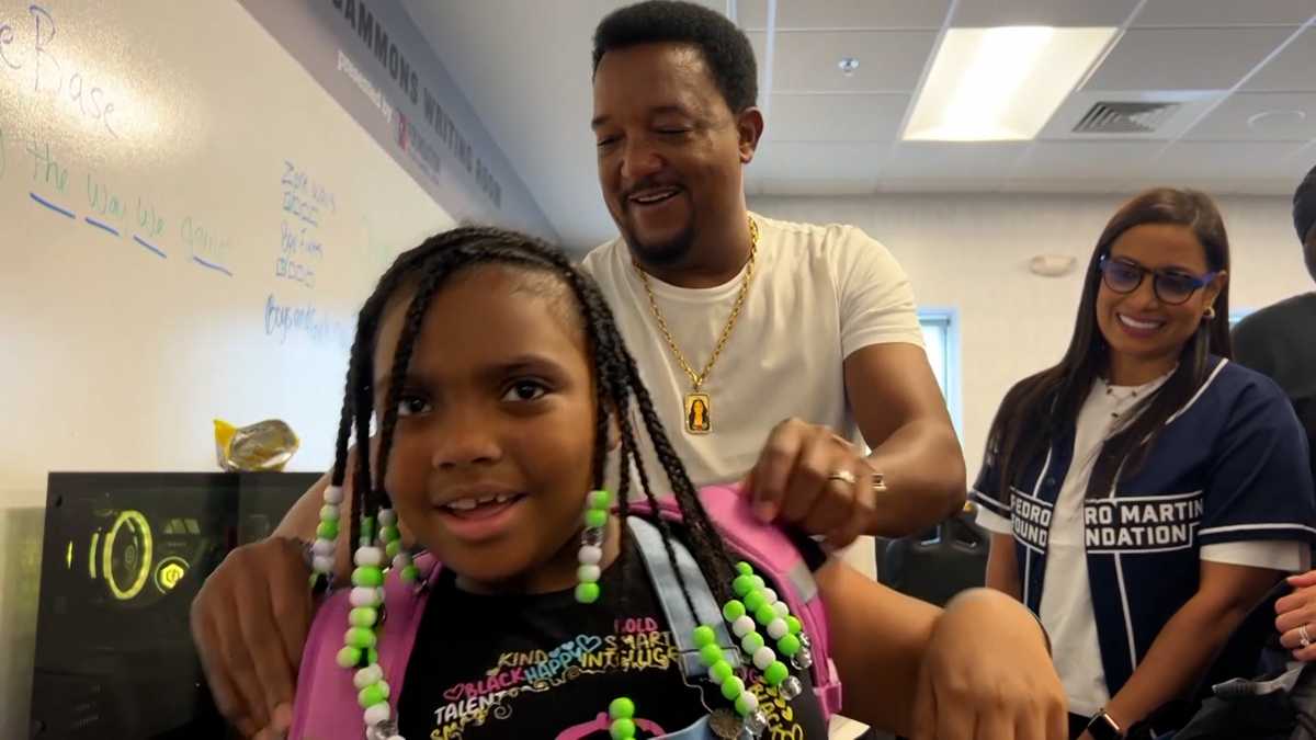 Red Sox legend Pedro Martinez hosts backpack giveaway in Boston