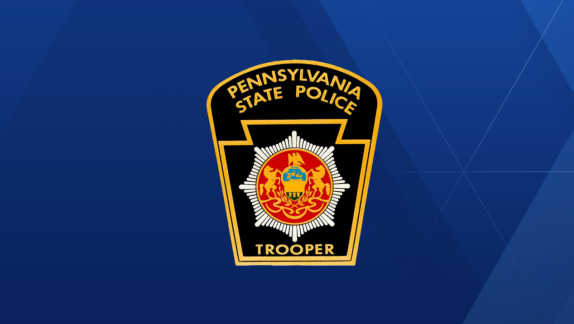 Pennsylvania State Police logo on a blue background.