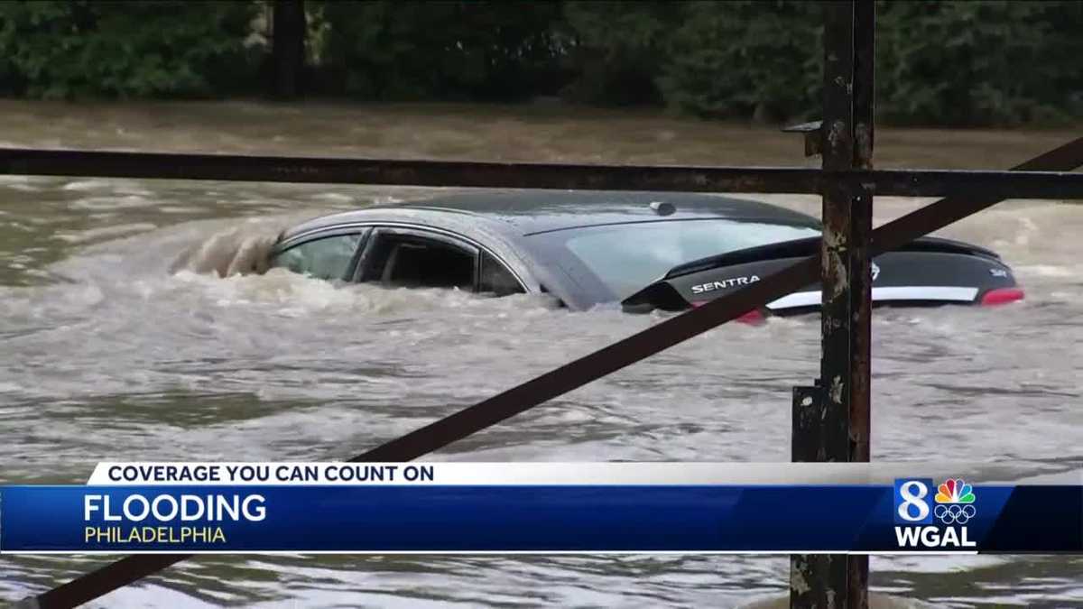 FLOODWATERS sweep through Philadelphia