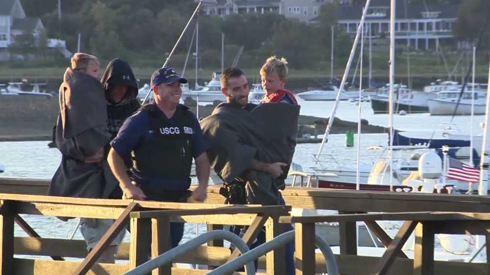 Missing boater, young sons rescued by Coast Guard
