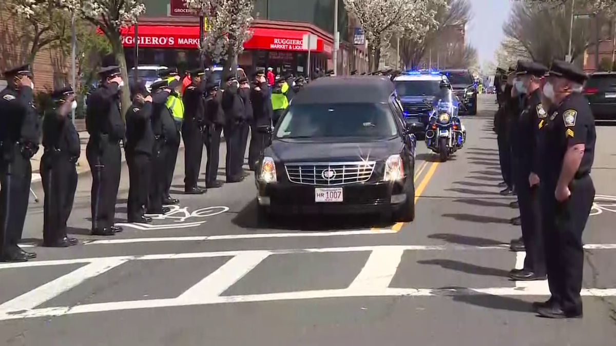 Procession brings Boston police officer who died of COVID19 to funeral