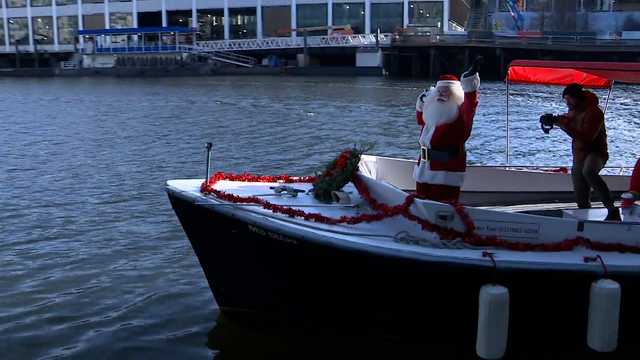 Santa arrives on water taxi for Christmas party with Boston kids - Vimarsana News