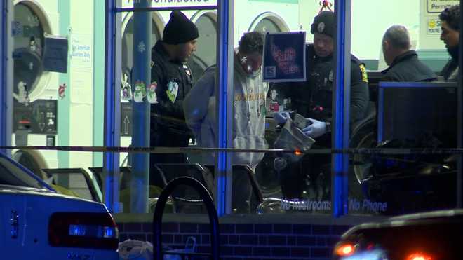 A&#x20;man&#x20;is&#x20;taken&#x20;into&#x20;custody&#x20;inside&#x20;the&#x20;Spin&#x20;Cycle&#x20;Laundromat&#x20;in&#x20;Somerville,&#x20;Massachusetts,&#x20;in&#x20;connection&#x20;with&#x20;a&#x20;stabbing&#x20;that&#x20;happened&#x20;inside&#x20;the&#x20;laundromat&#x20;on&#x20;Dec.&#x20;5,&#x20;2022.