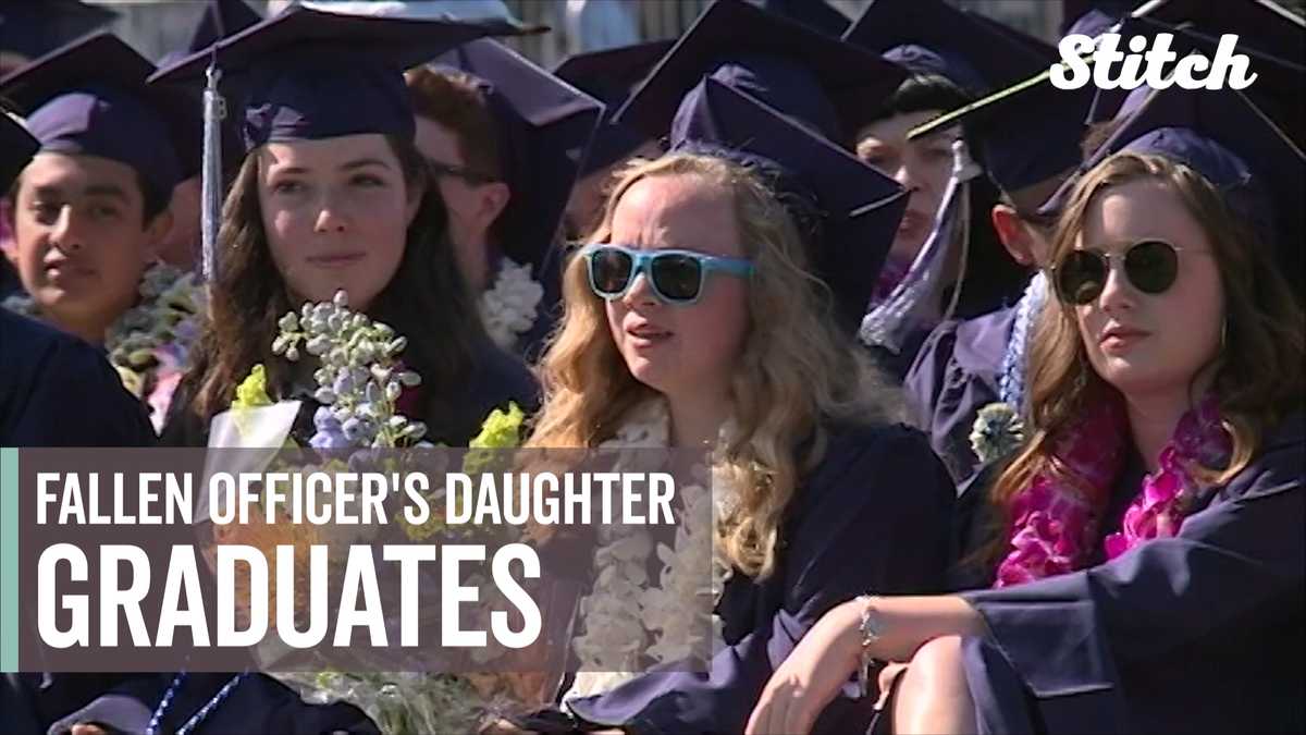 Police officers present high school diploma to daughter of fallen officer