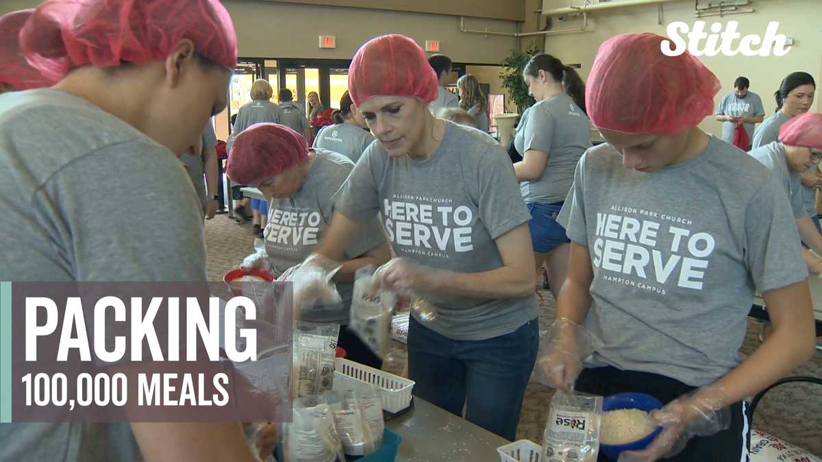 Volunteers help pack 100,000 meals to feed the hungry