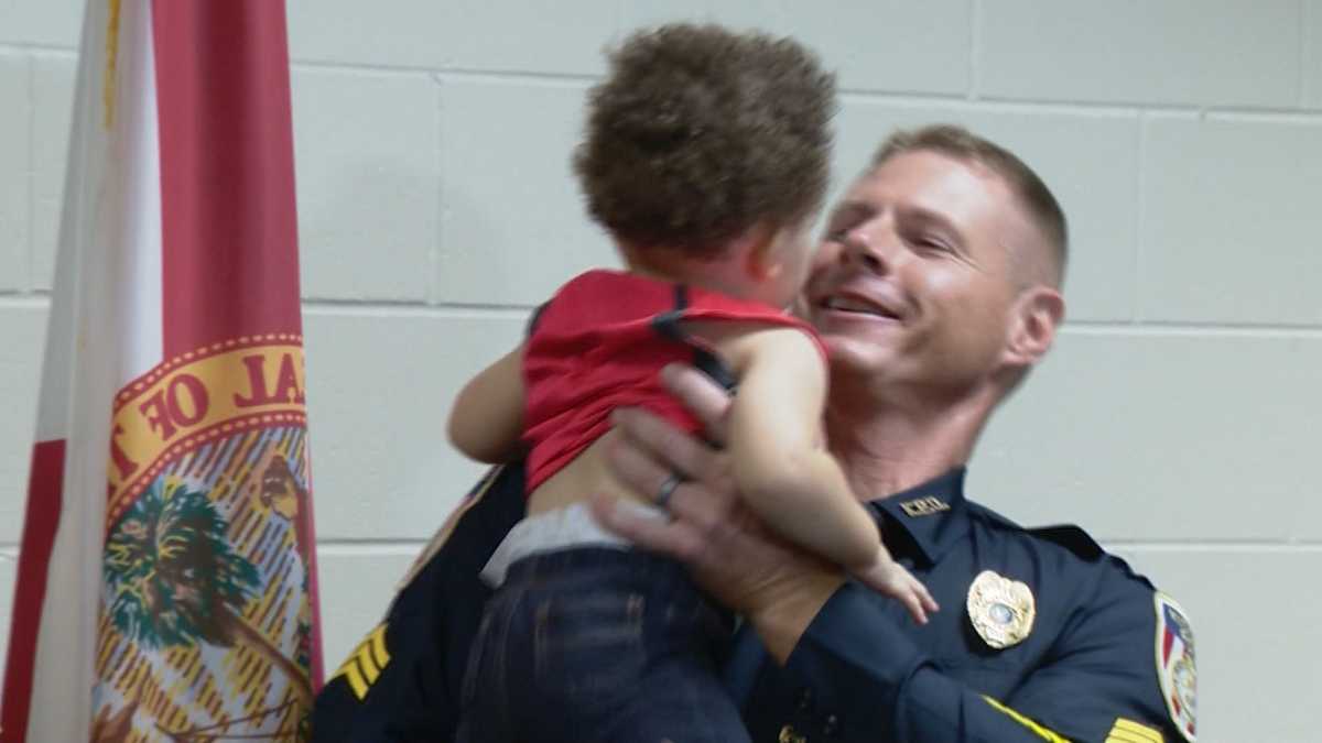 Police officers reunite with baby they saved from choking