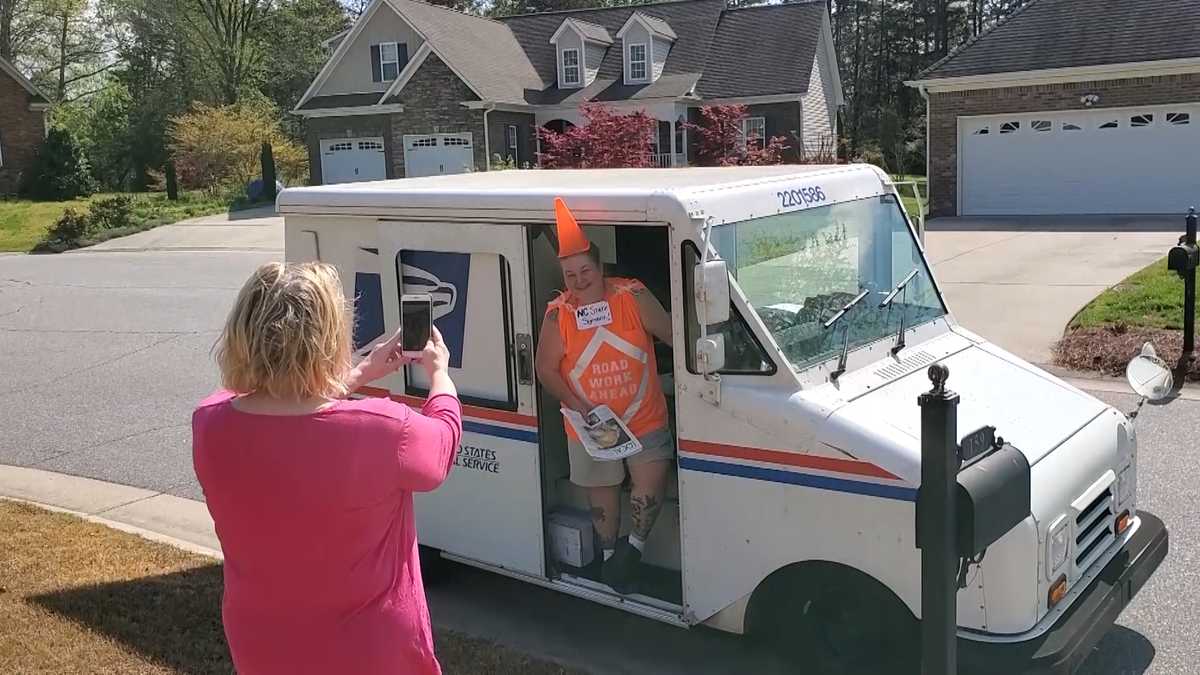 Mail carrier brings joy on her route with wild costumes