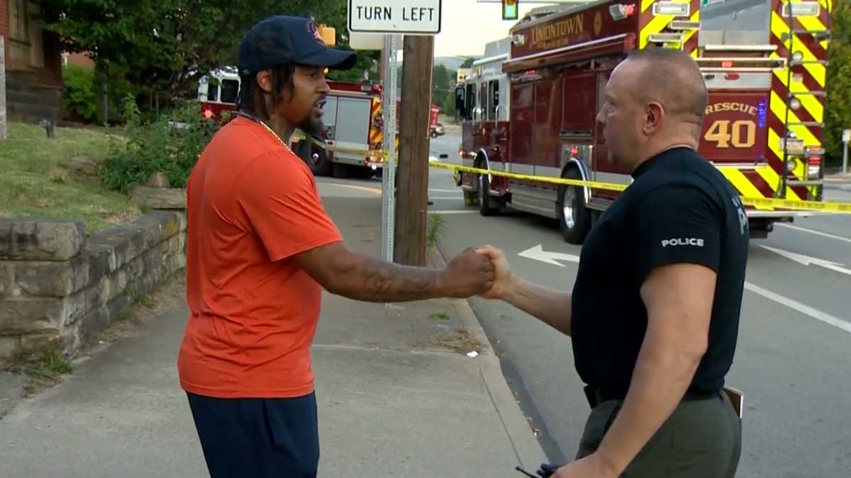 Bystander Steps Up To Save Police Officer From Fiery Crash