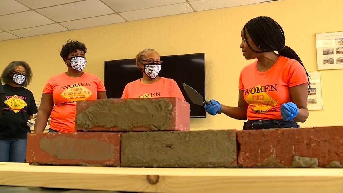 Women working at Women Under Construction