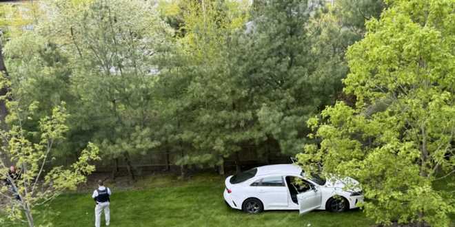 A&#x20;resident&#x20;of&#x20;Randolph,&#x20;Massachusetts,&#x20;says&#x20;suspects&#x20;in&#x20;an&#x20;armed&#x20;robbery&#x20;drove&#x20;this&#x20;car&#x20;into&#x20;his&#x20;backyard&#x20;off&#x20;the&#x20;cul-de-sac&#x20;at&#x20;the&#x20;end&#x20;of&#x20;Johnson&#x20;Drive&#x20;on&#x20;May&#x20;13,&#x20;2024.