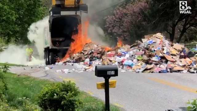 Truck dumps burning load of trash on road in York County, Pa. - Vimarsana News