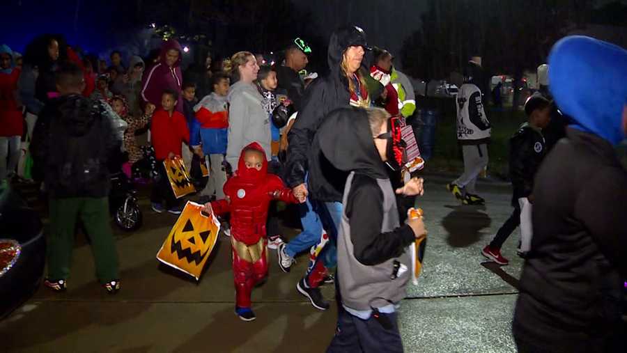 Trick-or-treating in the rain