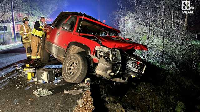 Crash leaves truck hanging off of bridge - Vimarsana News