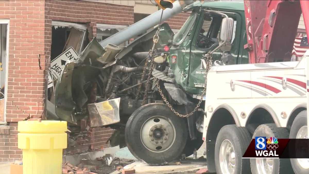 Trucks crash into New Holland store