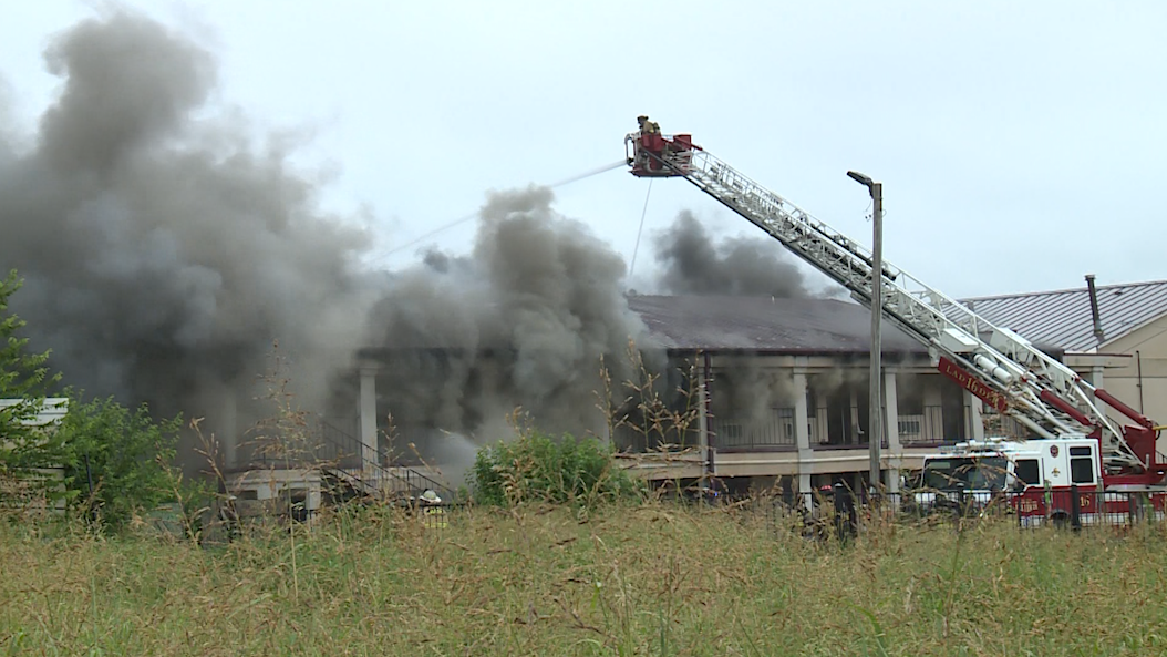 OKC vacant hotel fire sends 1 to hospital after balcony collapses