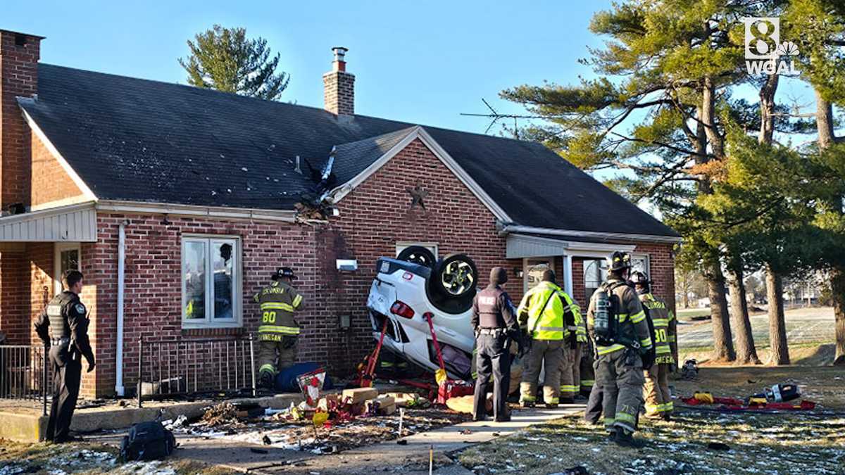 2 rescued after car flips into house in Lancaster County