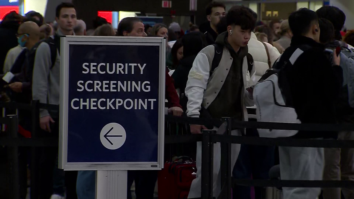 Holiday travelers packing Boston's Logan Airport