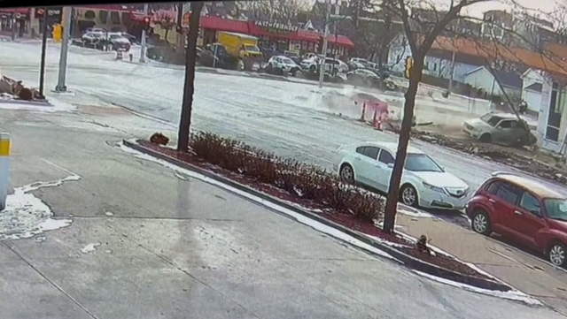 Watch: Chase crash takes out awning on new Milwaukee library; Worker hurt