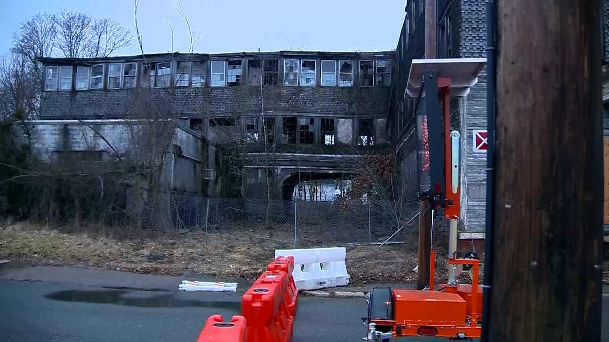Road closed as officials fear old mill building may collapse