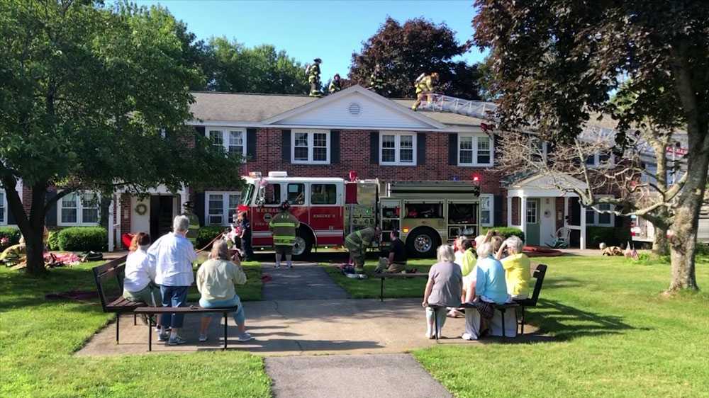 Woman, cats rescued after Wenham senior housing complex catches fire
