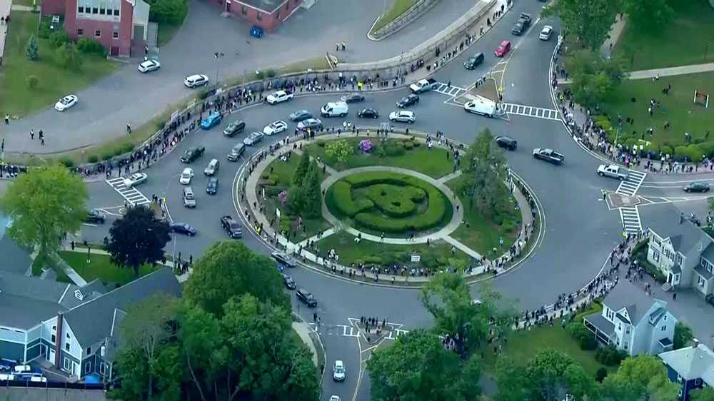 Hundreds take part in silent vigil in Boston in honor of George Floyd