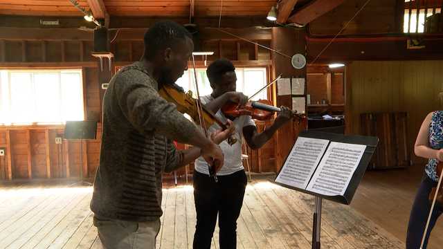 2 self-taught violinists from Kenya earn trip to program in Vermont - Vimarsana News