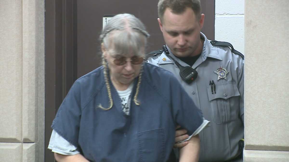Woman charged with infant deaths dating back to 1980s