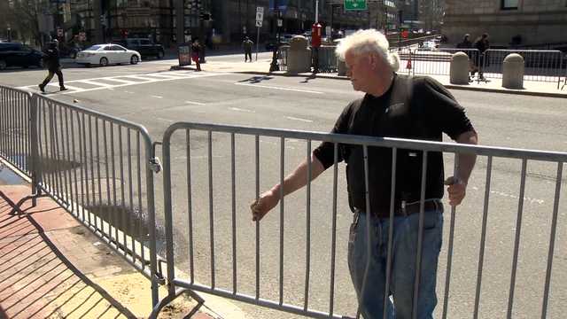 worker adds barrier to Boston Marathon course
